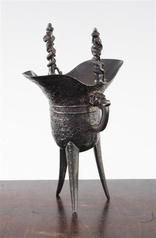 A late 19th century Japanese silver model of a Chinese archaic jue, 11 oz.